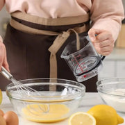 Kitchen Essential Adjustable Measuring Cup with Unique Scraper Base; Perfect for Every Cooking Need
